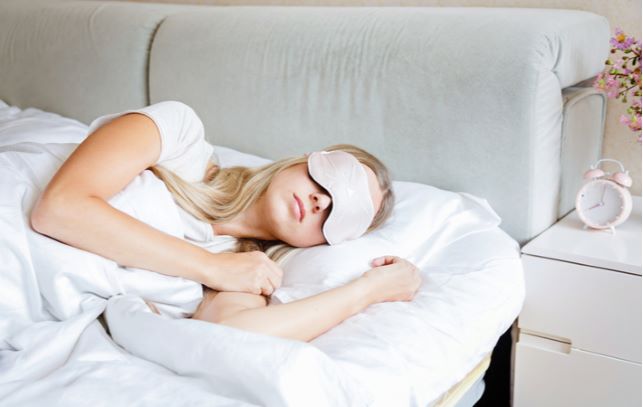 Women wearing heated eye mask to help with dry eye