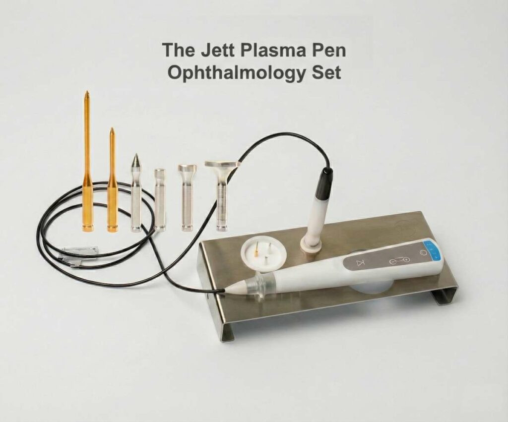 The Jett Plasma Pen Ophthalmology Set displayed on a metal tray, featuring the white handheld device, connecting cable, and a variety of interchangeable gold and silver applicator tips.